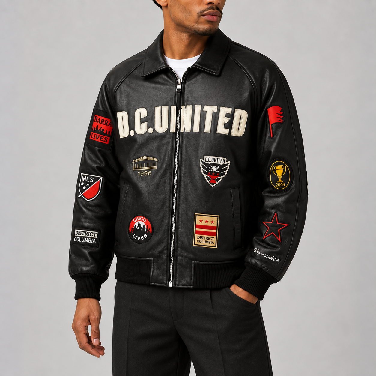 District Legacy leather jacket styled with tailored black trousers.