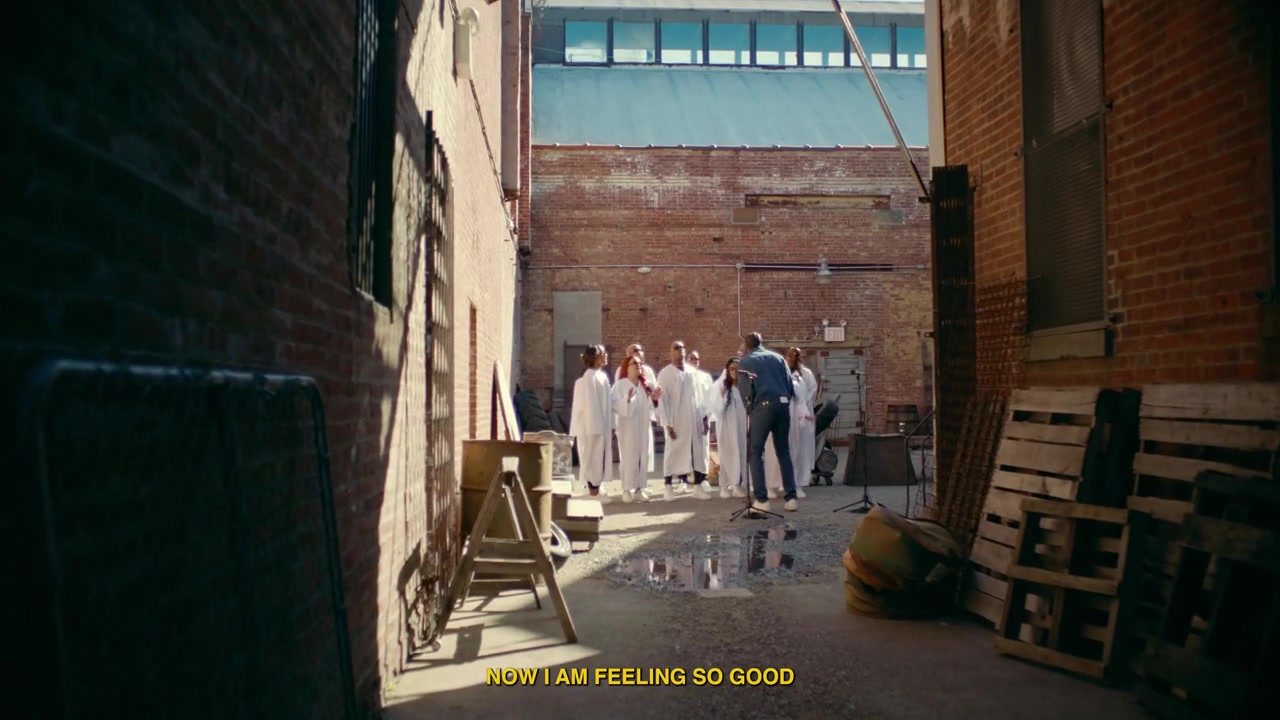 The New York City Gospel Choir performs in a Brooklyn courtyard.